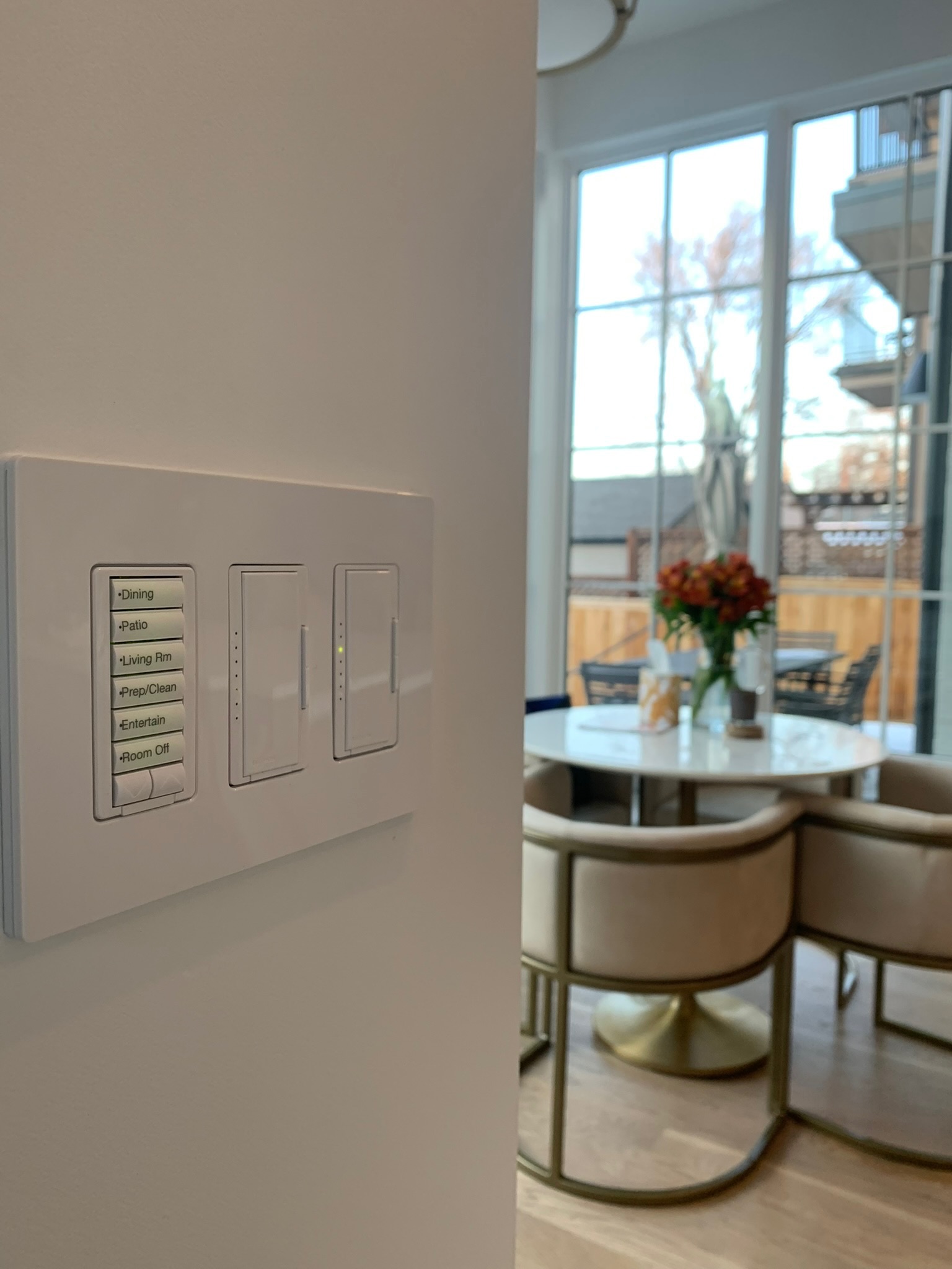 Lighting keypad with labeled room scene controls
